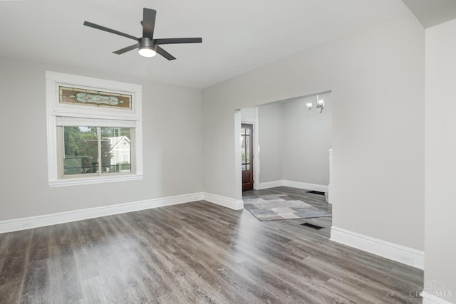 3846 Davis Ave, Cheviot, OH 45211 - empty room featuring wood finished floors, a chandelier, and ceiling fan