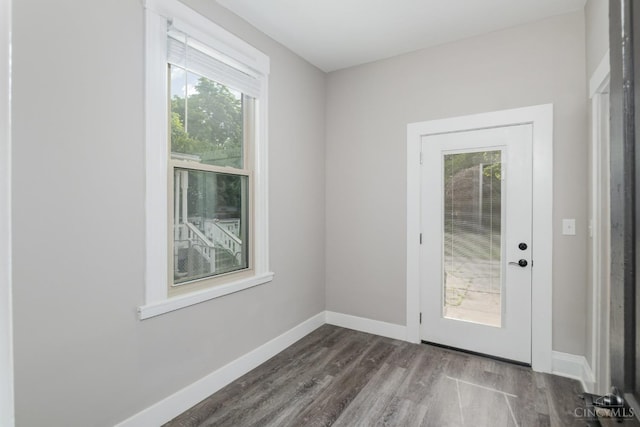 3846 Davis Ave, Cheviot, OH 45211 - doorway with dark wood-style floors and baseboards