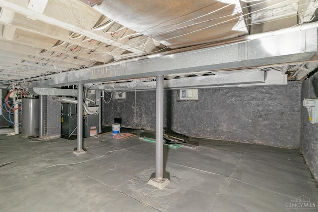 3846 Davis Ave, Cheviot, OH 45211 - unfinished basement with water heater and heating unit