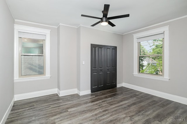 3846 Davis Ave, Cheviot, OH 45211 - unfurnished bedroom featuring dark wood-style floors, crown molding, and ceiling fan