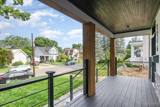 3846 Davis Ave, Cheviot, OH 45211 - wooden porch with a residential view and a lawn