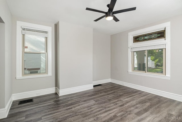 3846 Davis Ave, Cheviot, OH 45211 - unfurnished room with healthy amount of natural light, dark wood-style flooring, and ceiling fan