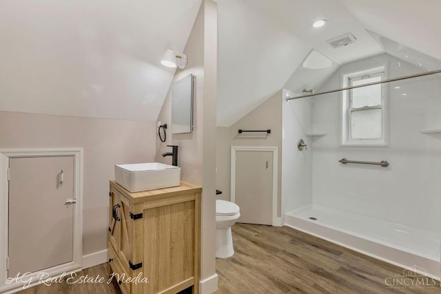 1502 Shenandoah, Cincinnati, OH 45237 - full bath featuring a shower, wood finished floors, vanity, and lofted ceiling