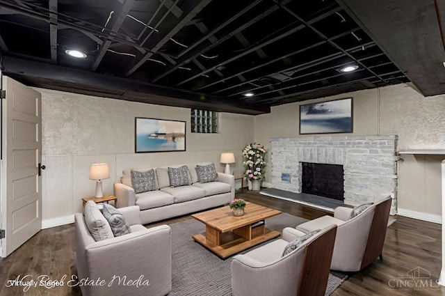 1502 Shenandoah, Cincinnati, OH 45237 - living room featuring wood finished floors and a fireplace with raised hearth