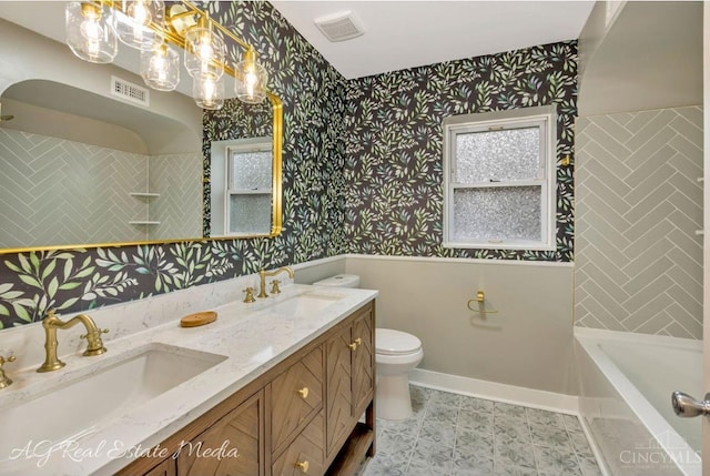 1502 Shenandoah, Cincinnati, OH 45237 - full bath featuring wallpapered walls, double vanity, wainscoting, and a chandelier