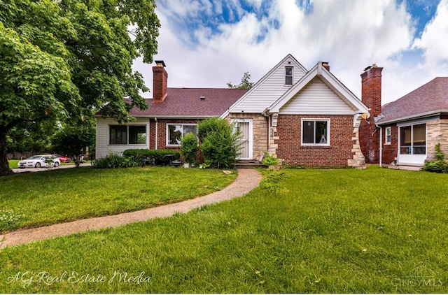 1502 Shenandoah, Cincinnati, OH 45237 - view of front of property with a front lawn, a chimney, and brick siding