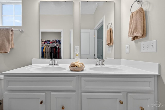 1285 Millstream Dr, Batavia Twp, OH 45102 - bathroom with double vanity and a walk in closet