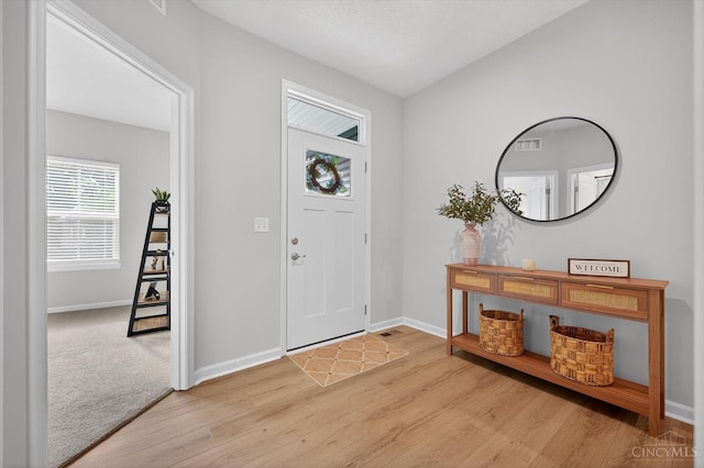 1285 Millstream Dr, Batavia Twp, OH 45102 - foyer entrance with light wood-style flooring and baseboards