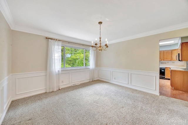 5505 Goldcrest Dr, Green Twp, OH 45238 - spare room with a chandelier, light carpet, ornamental molding, and a wainscoted wall