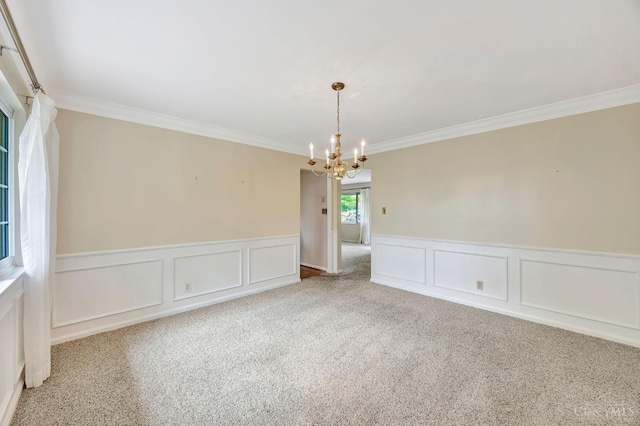 5505 Goldcrest Dr, Green Twp, OH 45238 - carpeted spare room with a chandelier, ornamental molding, wainscoting, and a decorative wall