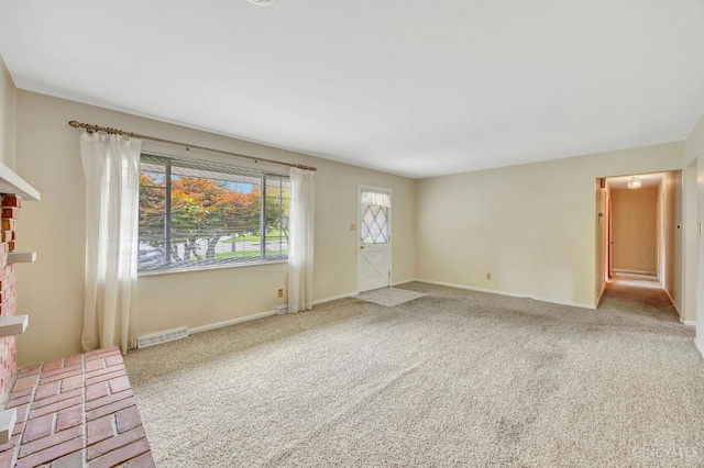 5505 Goldcrest Dr, Green Twp, OH 45238 - unfurnished living room featuring a fireplace and carpet