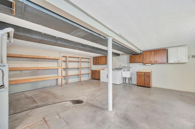 5505 Goldcrest Dr, Green Twp, OH 45238 - garage with washer and dryer and a sink