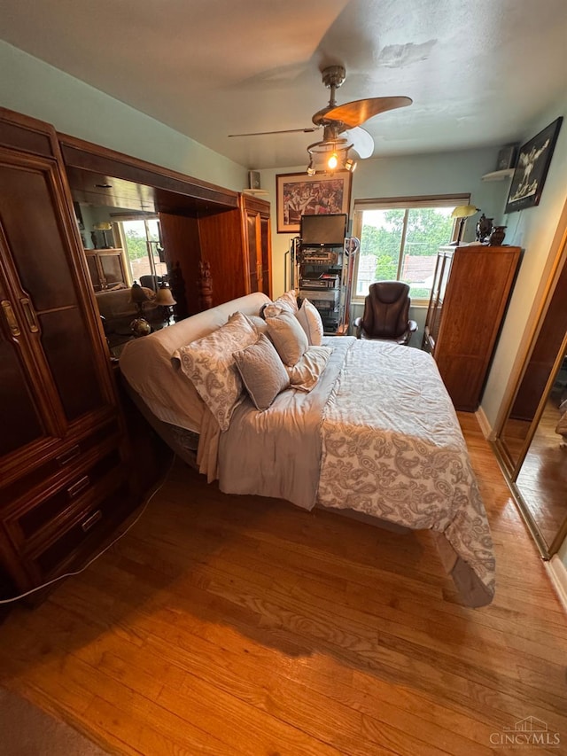 3969 S Fordham Pl, Silverton, OH 45213 - bedroom featuring light wood-style floors and ceiling fan