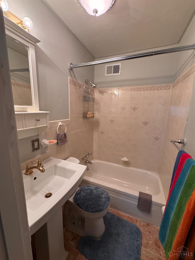 3969 S Fordham Pl, Silverton, OH 45213 - full bathroom with shower / washtub combination, tile patterned floors, and tile walls