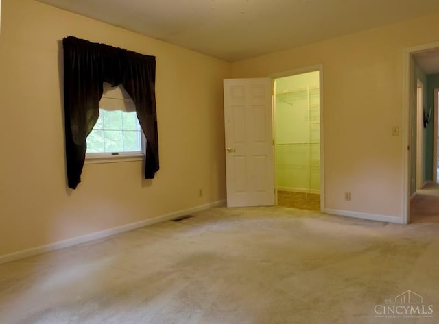1601 W Concord Rd, Pierce Twp, OH 45102 - unfurnished bedroom featuring carpet flooring and a spacious closet