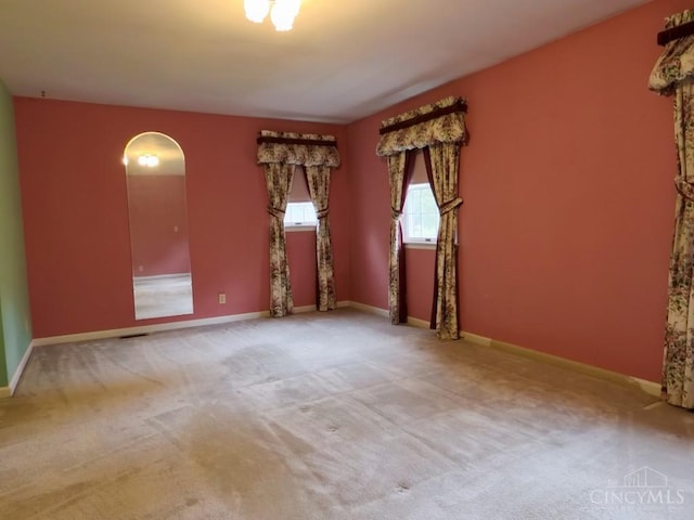 1601 W Concord Rd, Pierce Twp, OH 45102 - unfurnished room with arched walkways and carpet flooring