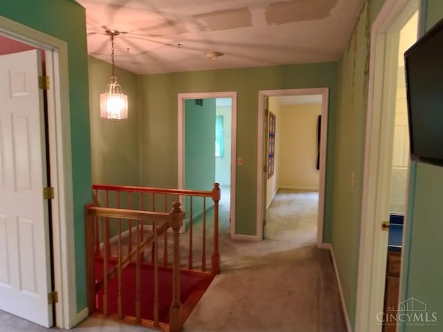 1601 W Concord Rd, Pierce Twp, OH 45102 - corridor featuring an upstairs landing and carpet