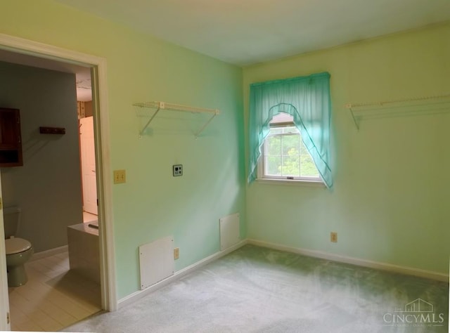 1601 W Concord Rd, Pierce Twp, OH 45102 - laundry area with baseboards and carpet floors