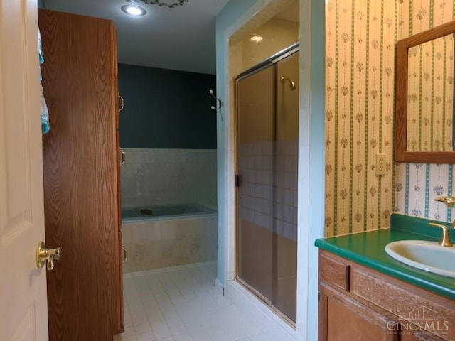 1601 W Concord Rd, Pierce Twp, OH 45102 - bathroom featuring a shower stall, tile patterned flooring, wallpapered walls, vanity, and a bath