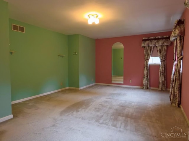1601 W Concord Rd, Pierce Twp, OH 45102 - carpeted spare room featuring arched walkways and baseboards