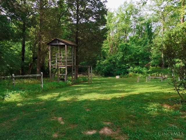 1601 W Concord Rd, Pierce Twp, OH 45102 - view of green lawn featuring a forest view