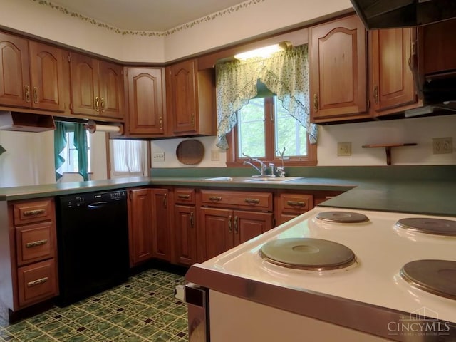 1601 W Concord Rd, Pierce Twp, OH 45102 - kitchen featuring dishwasher, brown cabinets, dark floors, and range