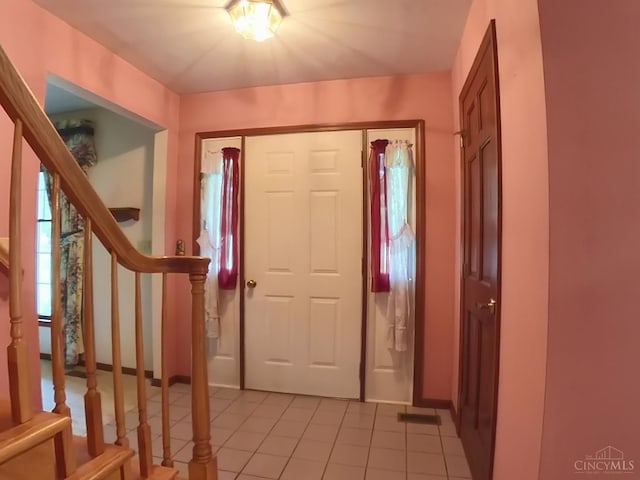 1601 W Concord Rd, Pierce Twp, OH 45102 - entrance foyer featuring stairs and light tile patterned floors