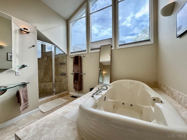 937 Monastery Unit B, Cincinnati, OH 45202 - full bathroom with a stall shower, a jetted tub, vaulted ceiling, and tile patterned floors