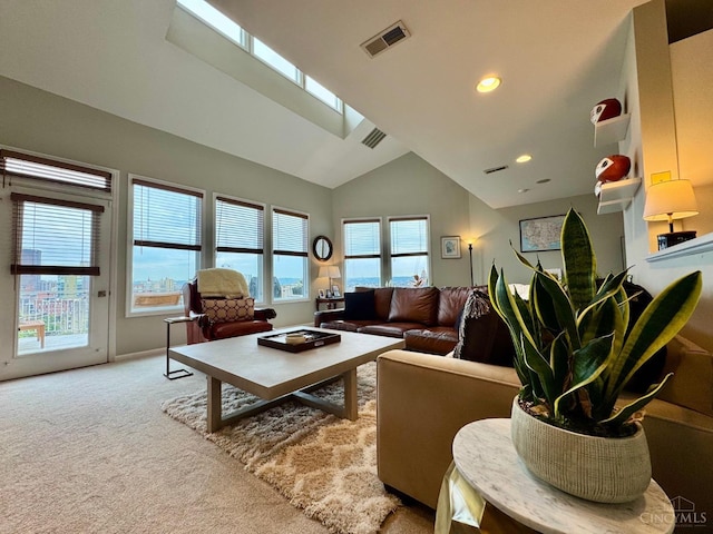 937 Monastery Unit B, Cincinnati, OH 45202 - living area with a skylight, carpet flooring, vaulted ceiling, and recessed lighting