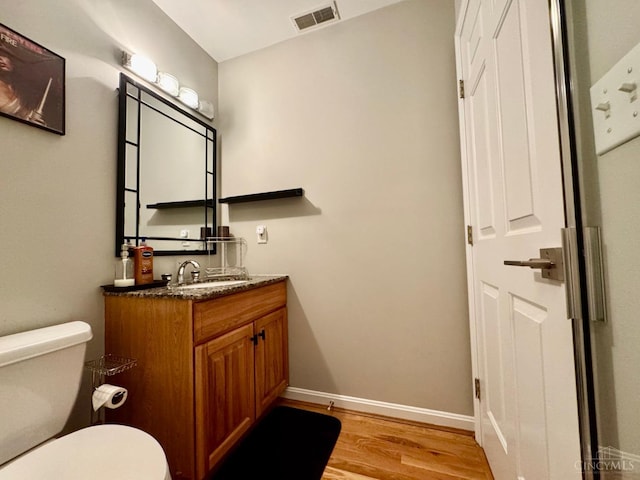 937 Monastery Unit B, Cincinnati, OH 45202 - half bathroom featuring vanity and wood finished floors
