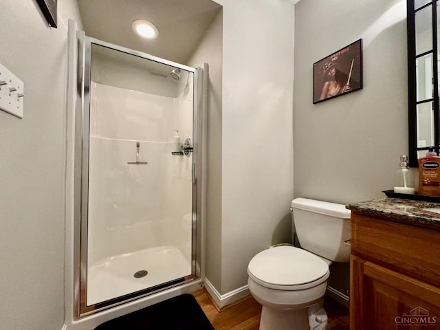 937 Monastery Unit B, Cincinnati, OH 45202 - bathroom with vanity, a stall shower, wood finished floors, and recessed lighting