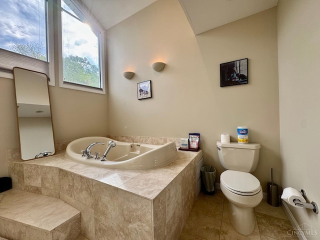 937 Monastery Unit B, Cincinnati, OH 45202 - bathroom featuring a garden tub, tile patterned flooring, and vaulted ceiling