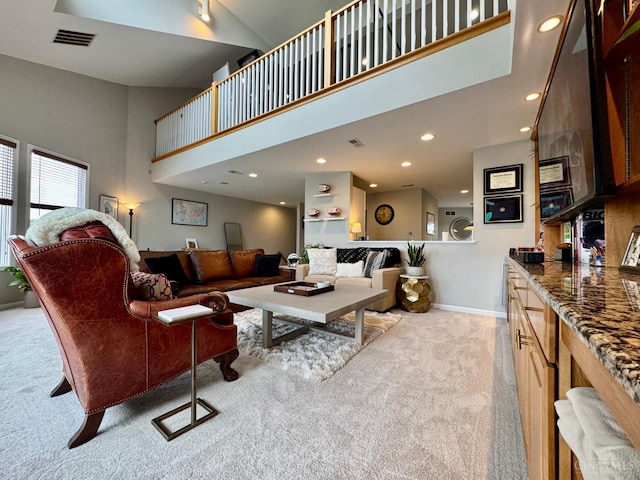 937 Monastery Unit B, Cincinnati, OH 45202 - living area featuring light carpet, a high ceiling, and recessed lighting