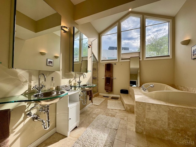 937 Monastery Unit B, Cincinnati, OH 45202 - full bathroom featuring a bath, plenty of natural light, and vaulted ceiling