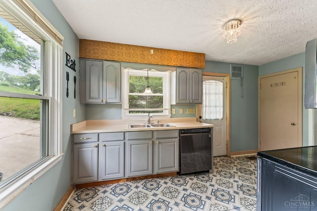 405 Hyde Park Dr, Hamilton, OH 45013 - kitchen featuring dishwashing machine, gray cabinets, a textured ceiling, range with electric cooktop, and light countertops
