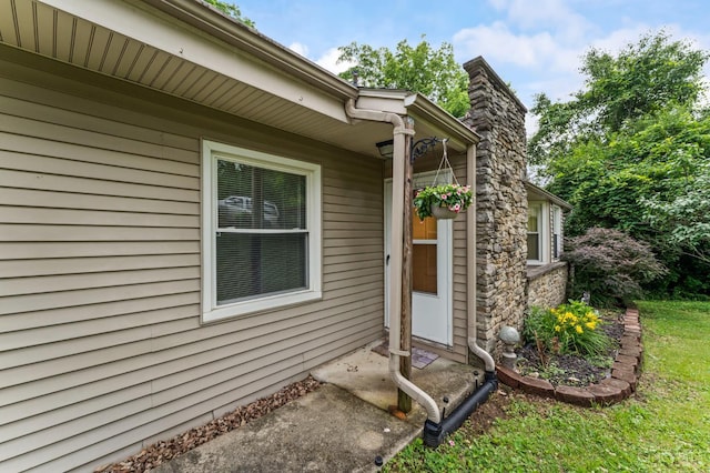 405 Hyde Park Dr, Hamilton, OH 45013 - entrance to property featuring a chimney and stone siding