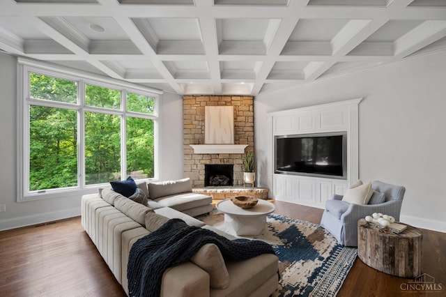 9317 E Kemper Rd, Symmes Twp, OH 45140 - living area with beamed ceiling, wood finished floors, coffered ceiling, and a fireplace