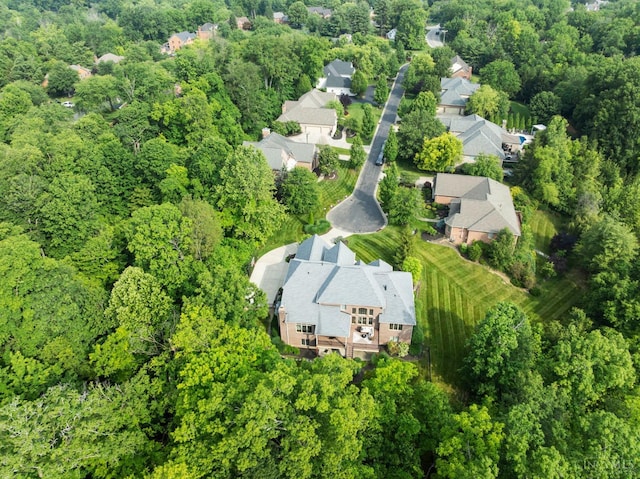 9317 E Kemper Rd, Symmes Twp, OH 45140 - aerial view of property's location with a heavily wooded area and nearby suburban area