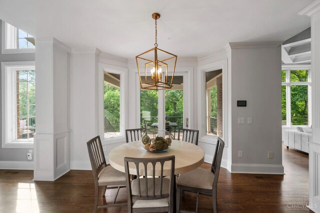 9317 E Kemper Rd, Symmes Twp, OH 45140 - dining area with a chandelier, dark wood-style flooring, and ornamental molding
