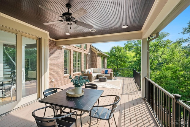9317 E Kemper Rd, Symmes Twp, OH 45140 - wooden deck featuring a ceiling fan and an outdoor living space