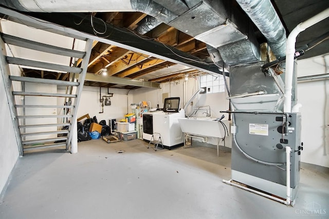 5521 Chandler St, Cincinnati, OH 45227 - basement with separate washer and dryer and heating unit