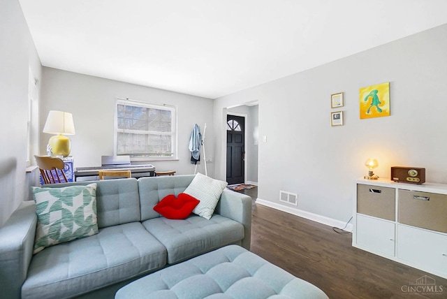 5521 Chandler St, Cincinnati, OH 45227 - living room featuring dark wood-style flooring and baseboards