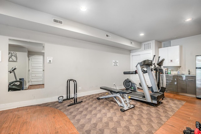 2356 Park Ave Unit 9, Cincinnati, OH 45206 - workout area featuring recessed lighting and wood finished floors