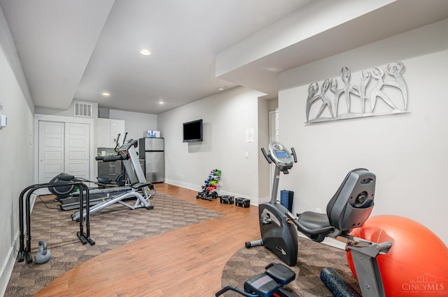 2356 Park Ave Unit 9, Cincinnati, OH 45206 - workout room featuring wood finished floors and recessed lighting