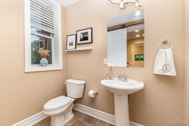 2356 Park Ave Unit 9, Cincinnati, OH 45206 - bathroom featuring baseboards and toilet