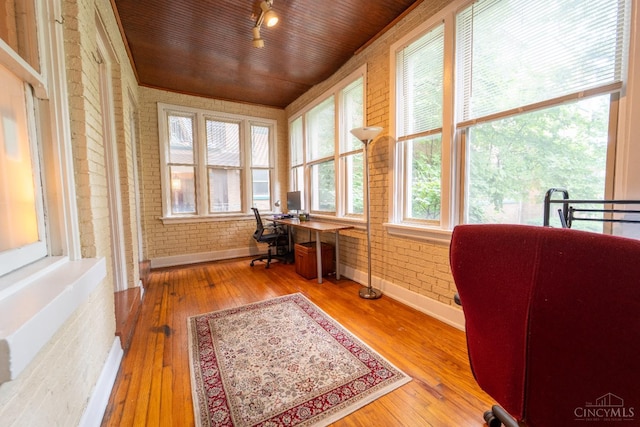 3896 Reading Rd Unit M, Cincinnati, OH 45229 - office area with brick wall, wood-type flooring, wood ceiling, and built in study area