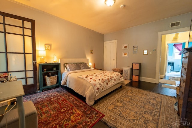 3896 Reading Rd Unit M, Cincinnati, OH 45229 - bedroom with baseboards and wood finished floors
