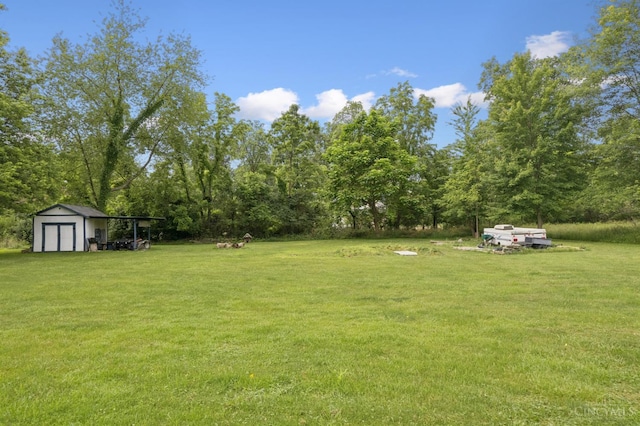 648 Odenwald Dr, Perry Twp, OH 45118 - view of green lawn with a storage unit
