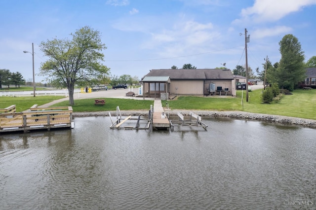 648 Odenwald Dr, Perry Twp, OH 45118 - dock with boat lift, a water view, and a lawn