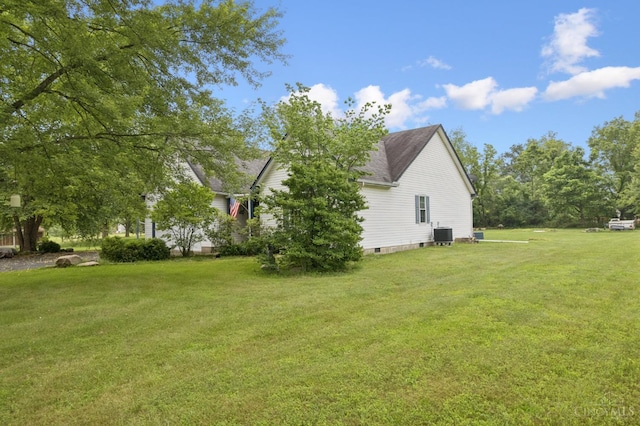 648 Odenwald Dr, Perry Twp, OH 45118 - view of side of home with a lawn and a shingled roof